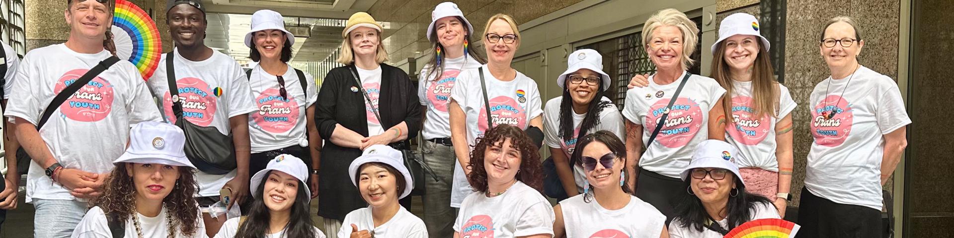 YWCA team members gather before attending the 2025 Vancouver Pride Parade.