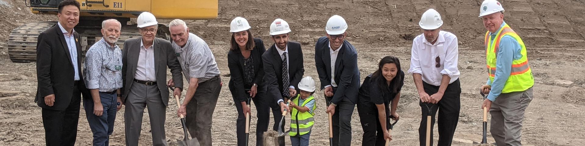 People standing at a groundbreaking