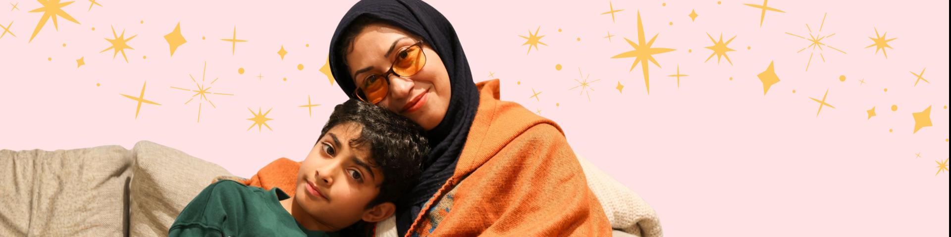 Photo of YWCA program participant and her son with sparkles in the background