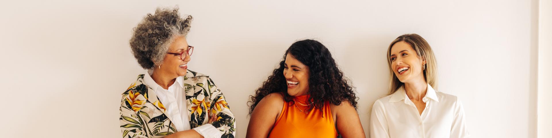 Multiethnic group of women laughing