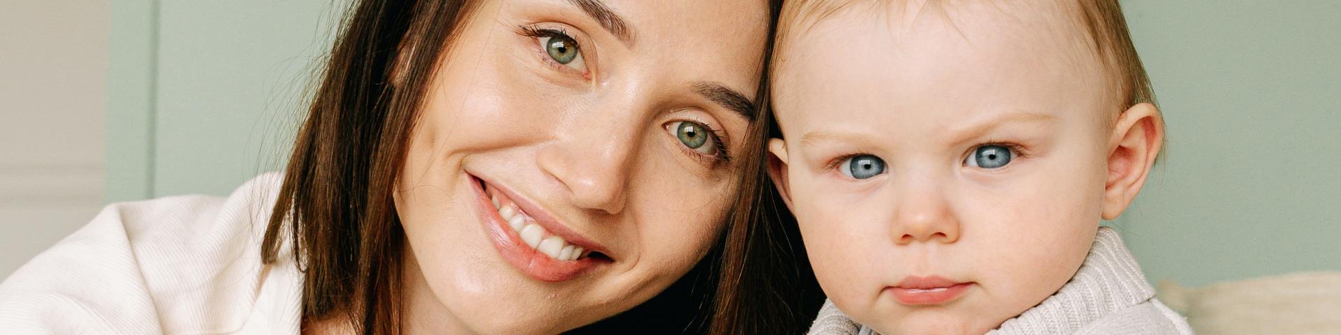 Ukrainian mother and baby smiling