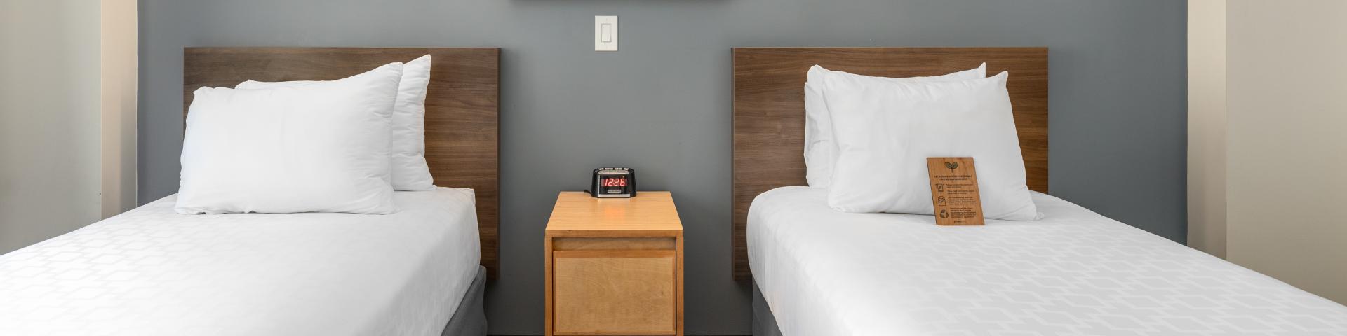 Twin Beds with Hallway Bath