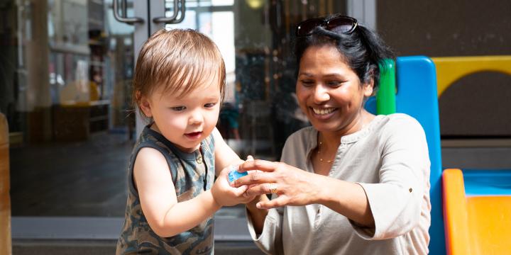 Early Chilhood Educator play with child at YWCA child care centre