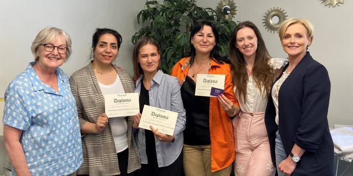 YWCA Engage Mentorship Hub participants and facilitators with Sandrine Ramoisy of Tips Academy (right).