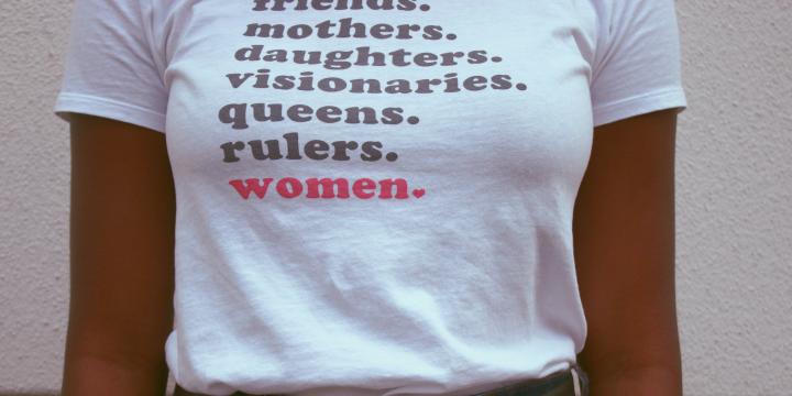 Woman wearing a feminist t-shirt