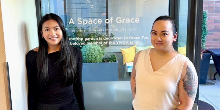 Grace’s daughters, Robbie and Nikki, at the entrance to YWCA Hotel’s A Space of Grace.  