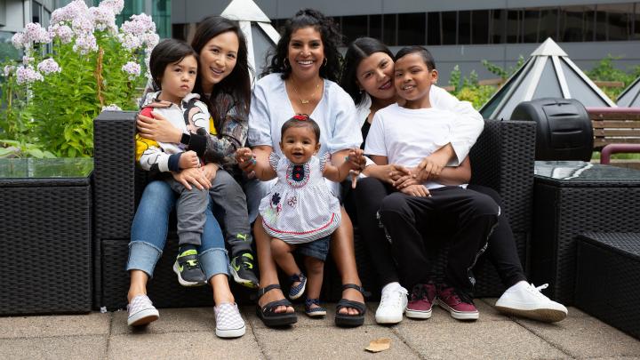 Mothers and children at the YWCA rooftop garden