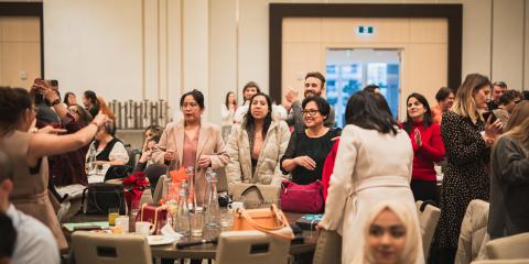 YWCA Metro Vancouver staff gather to celebrate our annual Holiday Breakfast at JW Marriott Parq Vancouver.  