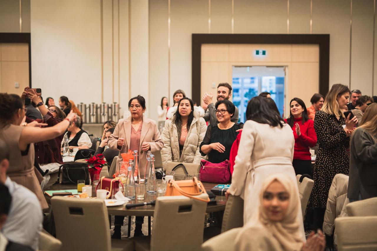 YWCA Metro Vancouver staff gather to celebrate our annual Holiday Breakfast at JW Marriott Parq Vancouver.  