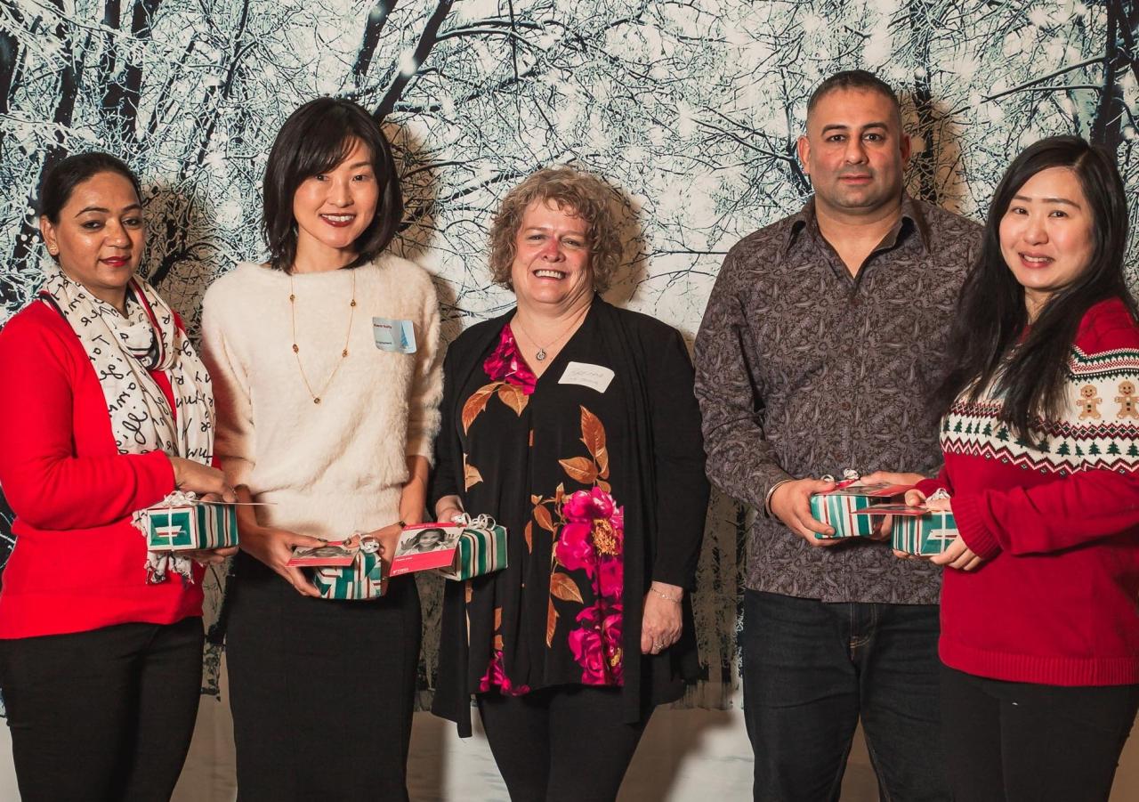 YWCA Metro Vancouver employees receive a gift in recognition of their 10th anniversary with the organization at our Long Service Awards.