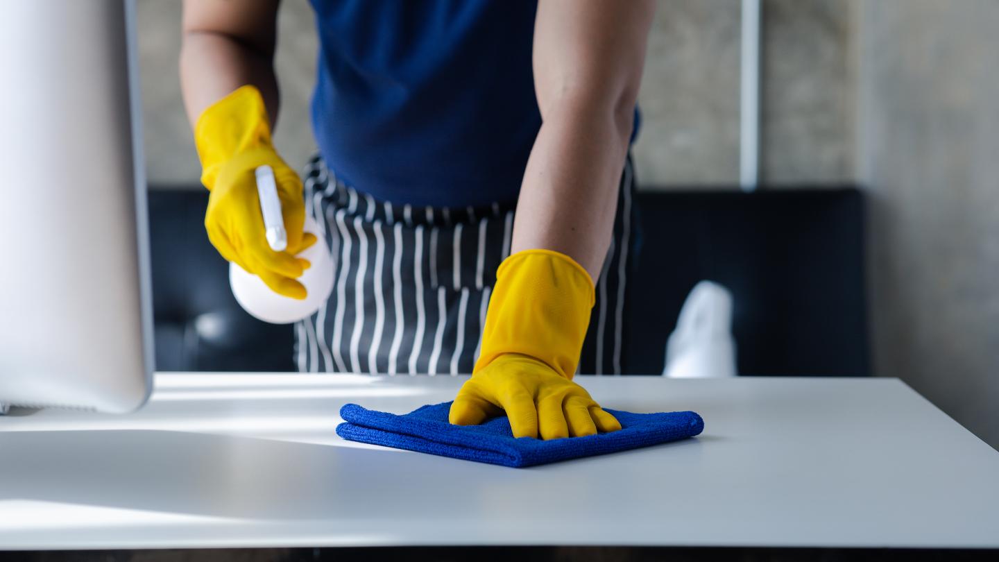 Picture of person cleaning the room