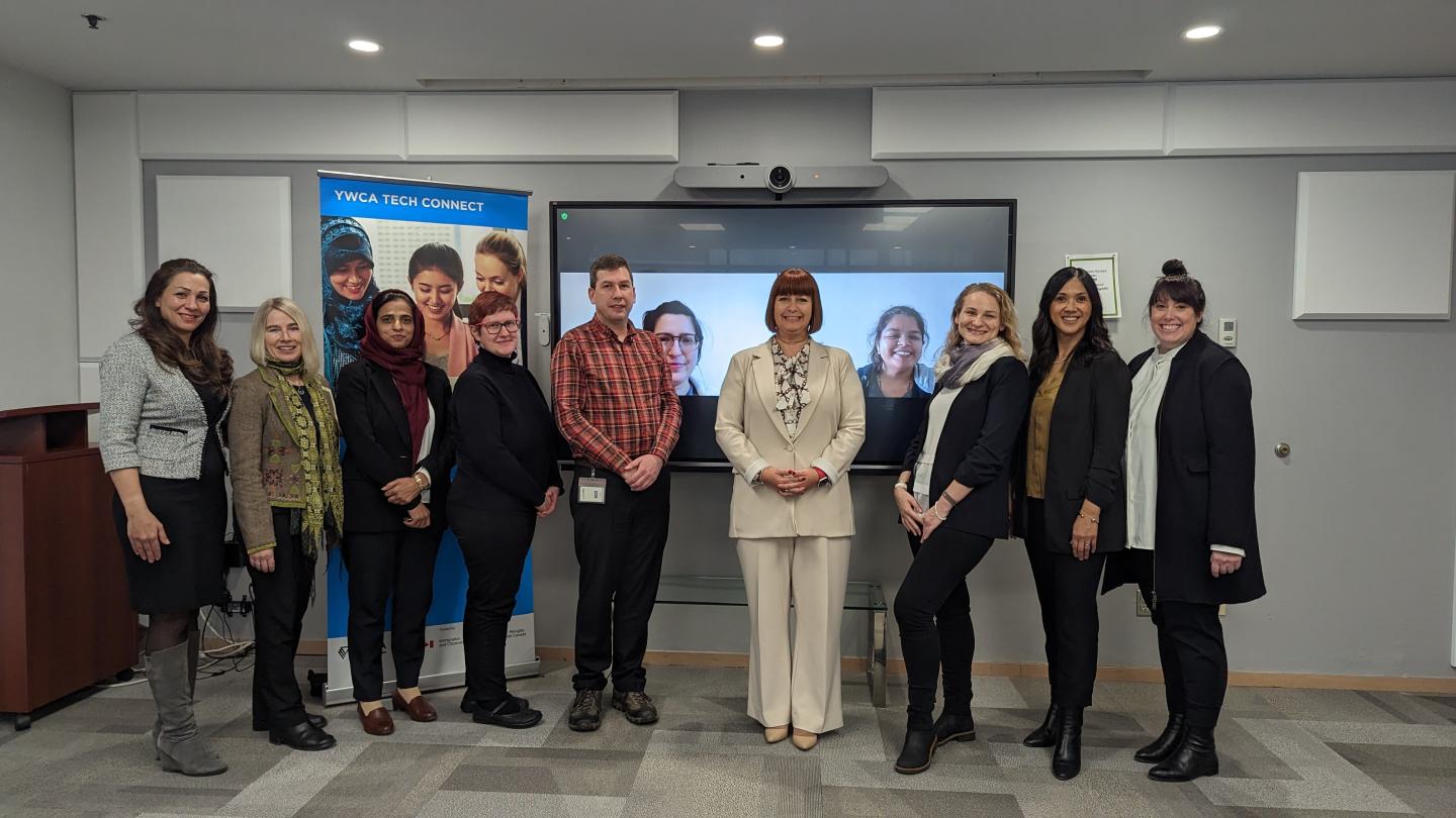 IRCC members, Tech Connect participants and YWCA staff gathered during the announcement. 