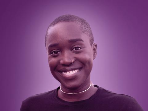 Photo of Nic Wayara with purple background