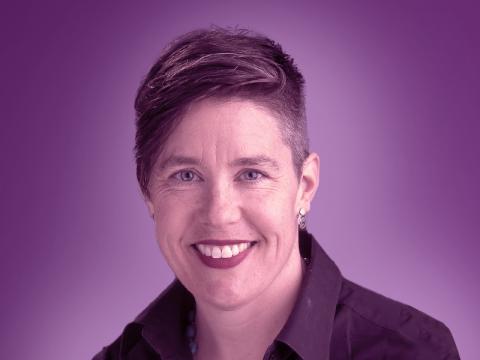Photo of Tiffany Muller Myrdahl on purple background