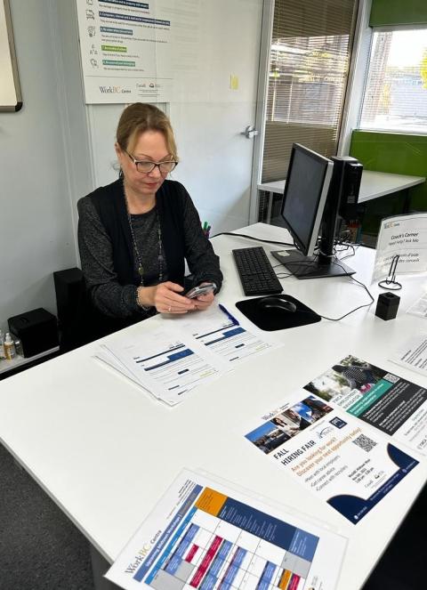 Erica Jones at her desk