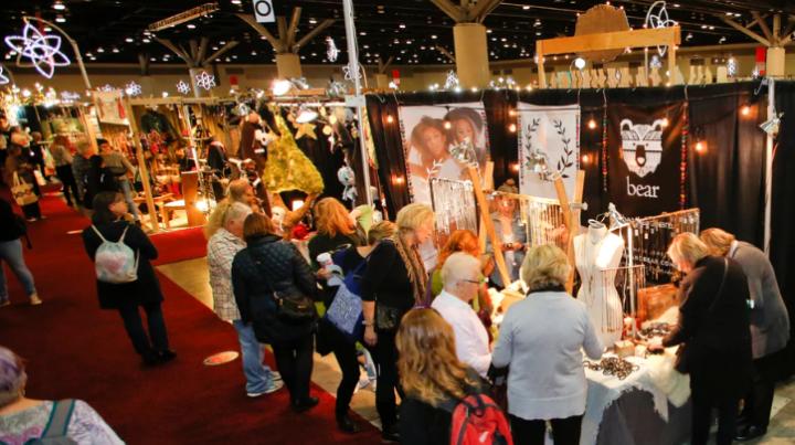 Photo of shoppers and booths at The Circle Christ Christmas Market