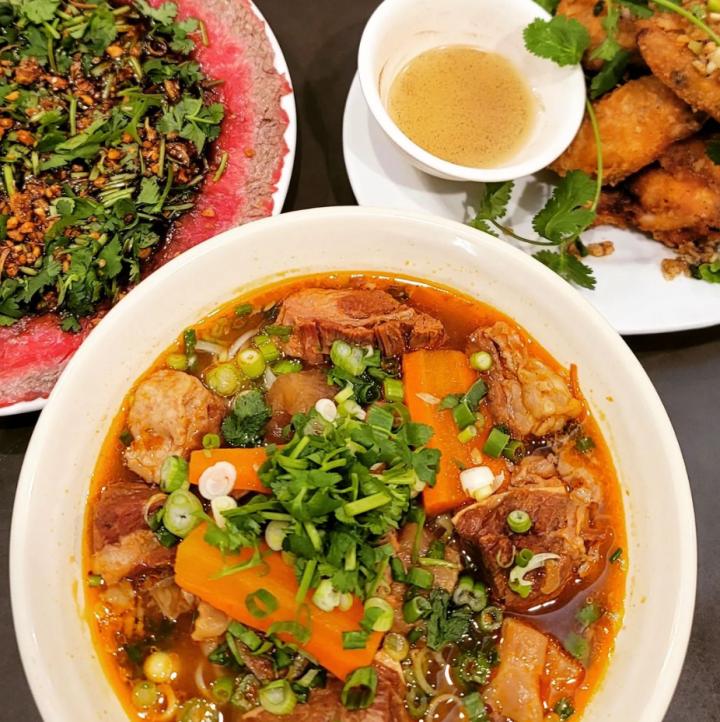 Photo of soup noodle, chicken wings and butter beef at Phnom Penh