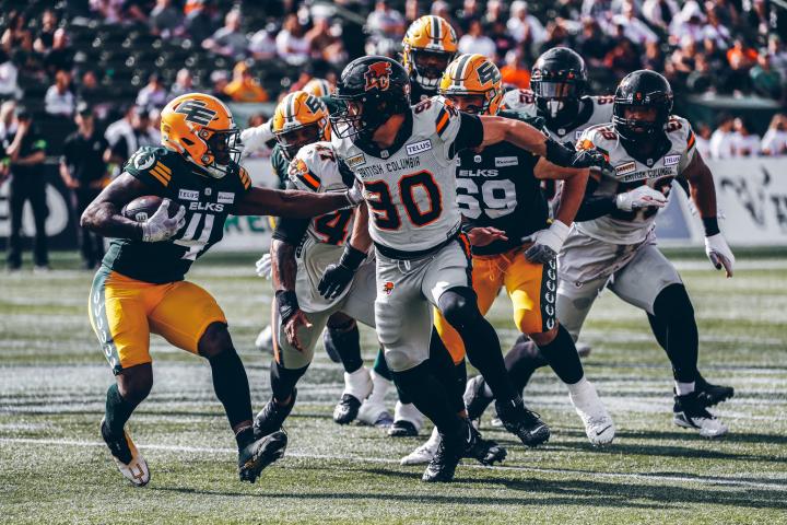 Photo of BC Lions in mid-play