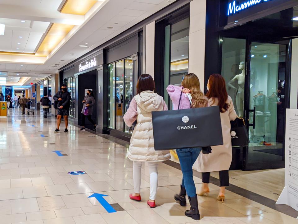shoppers in malls during COVID