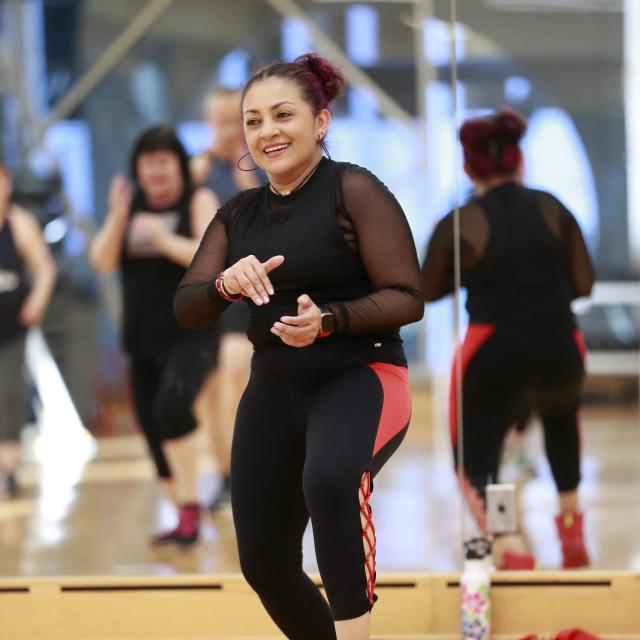 Group fitness Zumba class with everyone having fun