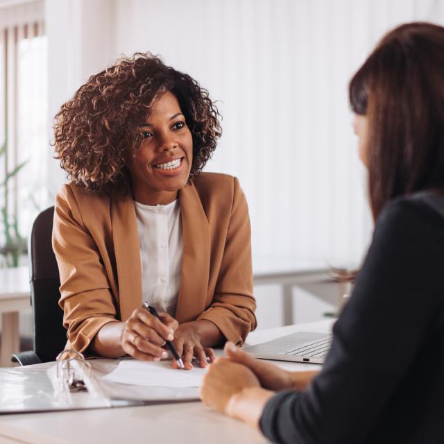 Woman consulting with a female financial manager