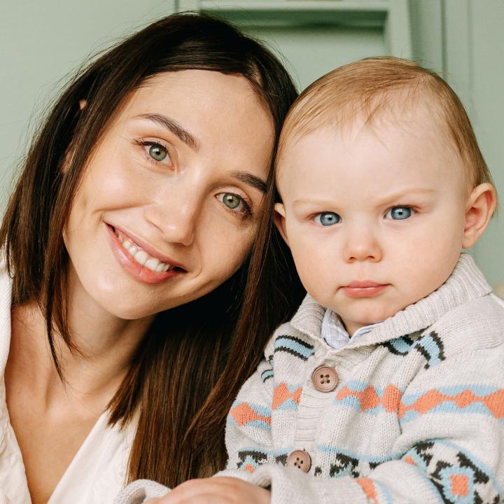Mother and baby smiling